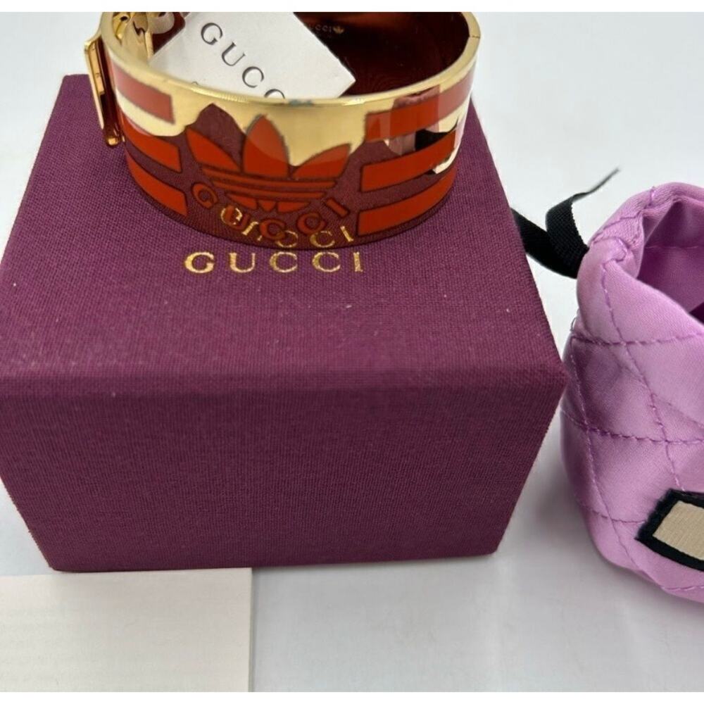 Women's Gucci X Adidas gold/orange cuff bracelet made in Italy